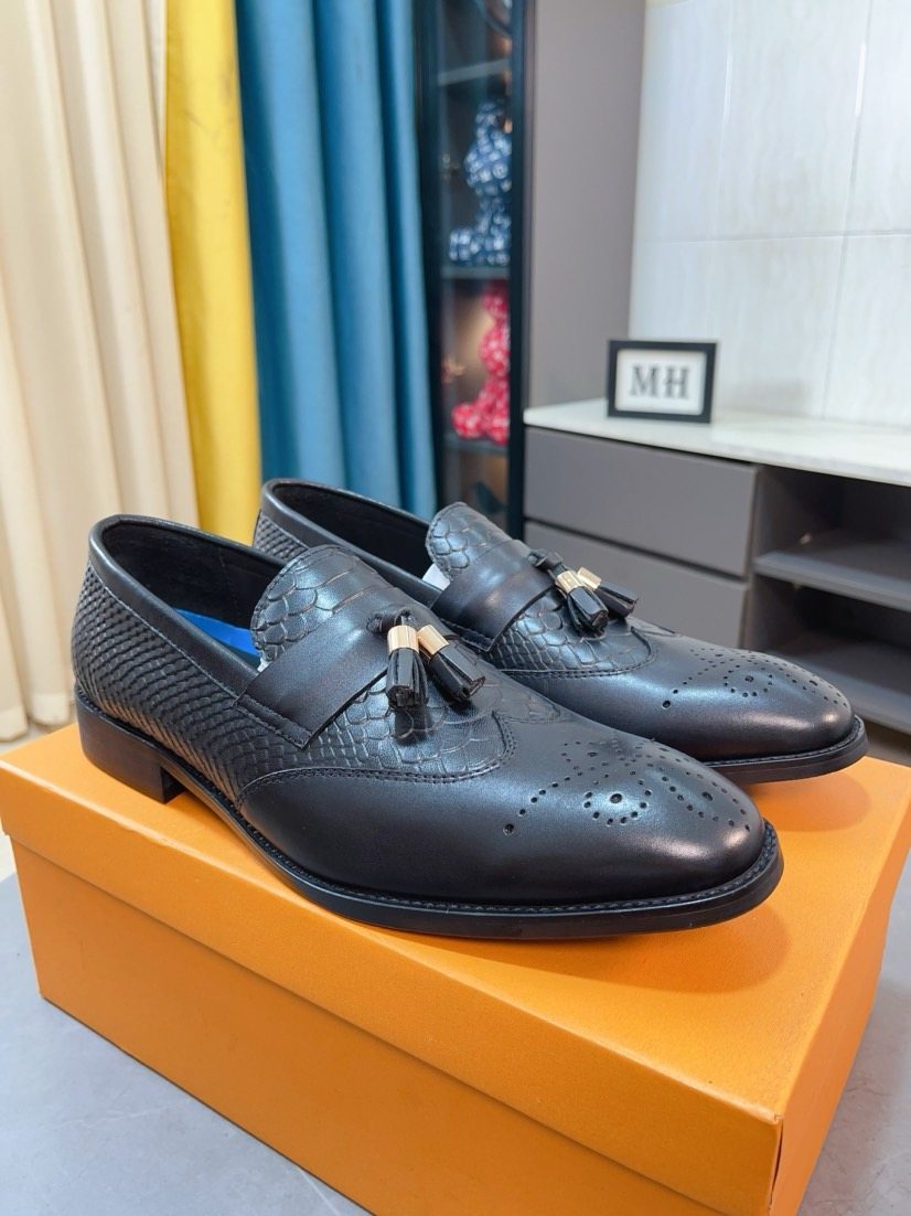 Louis Vuitton Black Tassel Loafers — hero
