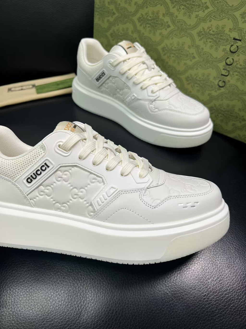 Gucci Embossed Low-Top Sneakers — side