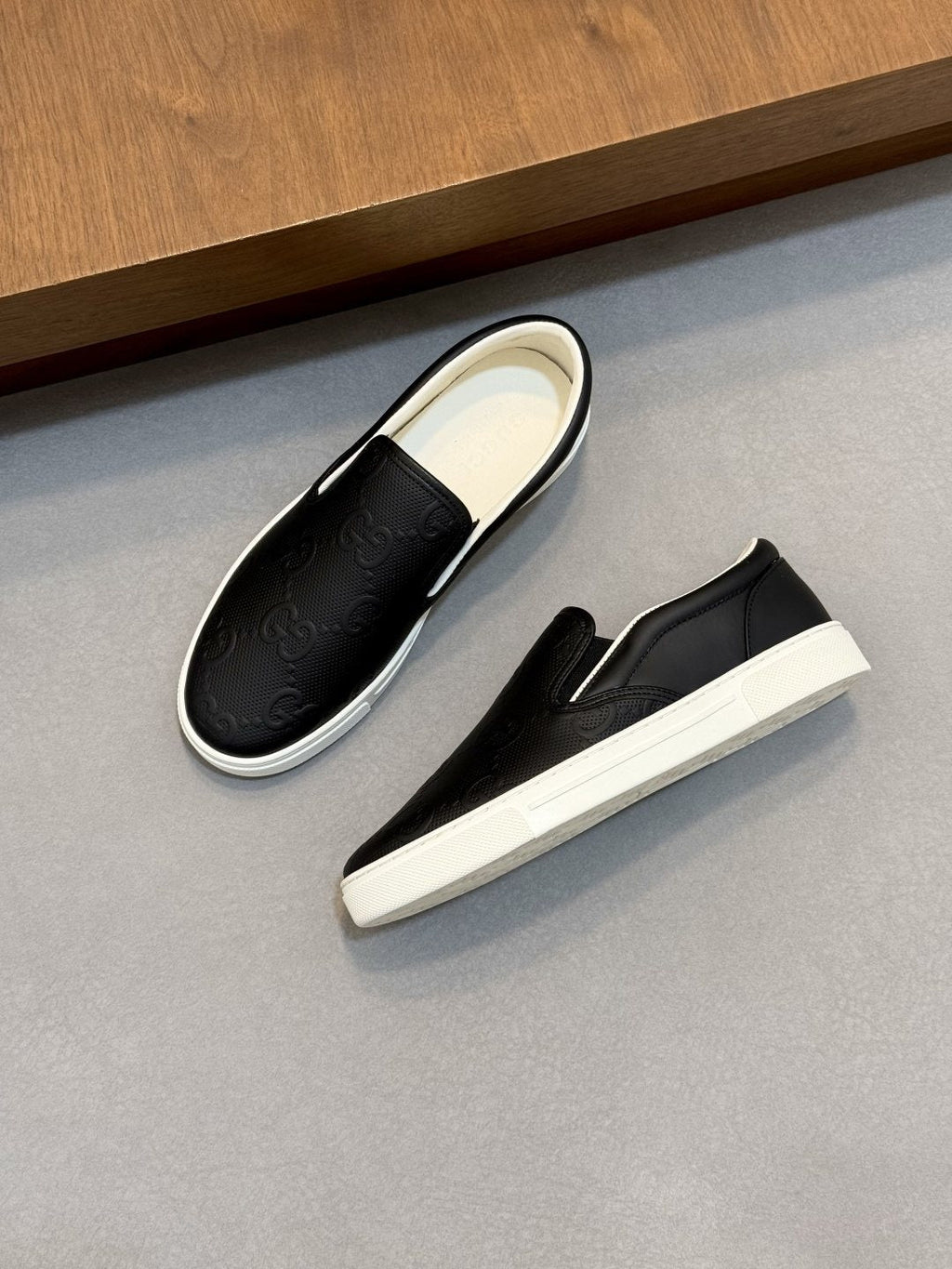 Gucci Embossed Slip-On Sneakers — front